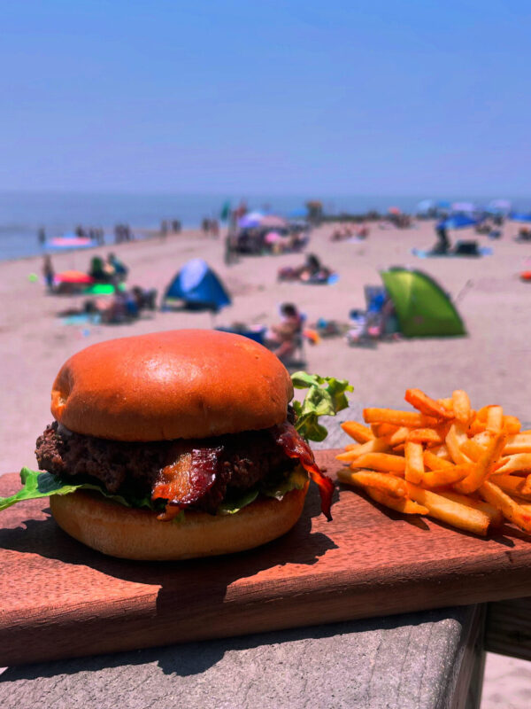 Smash burger and hand-cut fries on the sand at Penfield Beach, Fairfield